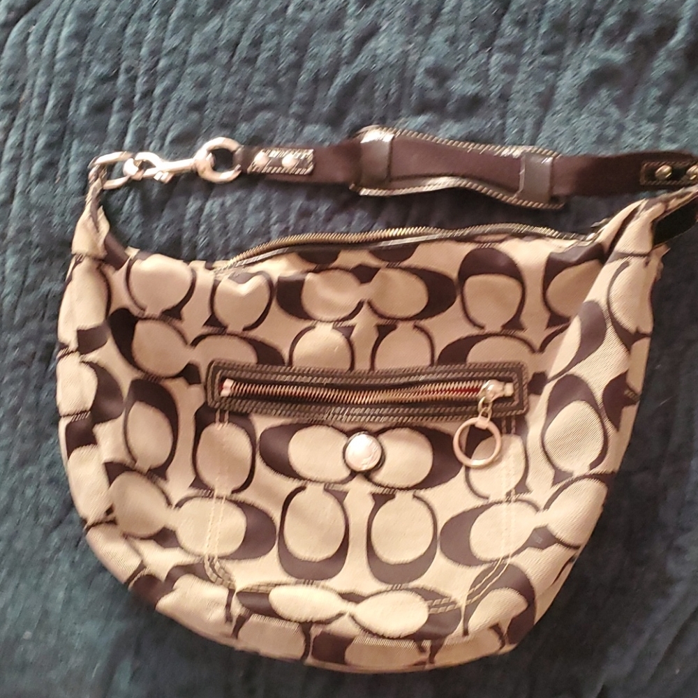 Beautiful black-and-white pink inside coach purse